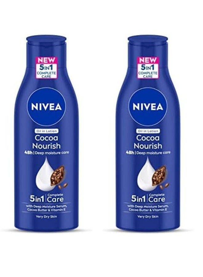 نيفيا لوشن الجسم نيفيا كاكاو المغذي بسعة 200 مل مع سيروم الترطيب العميق | ترطيب يدوم 48 ساعة | غني بزبدة الكاكاو وزيت جوز الهند | تركيبة غير دهنية لبشرة صحية المظهر | مناسب للبشرة شديدة الجفاف (عبوة من قطعتين) - Image 1